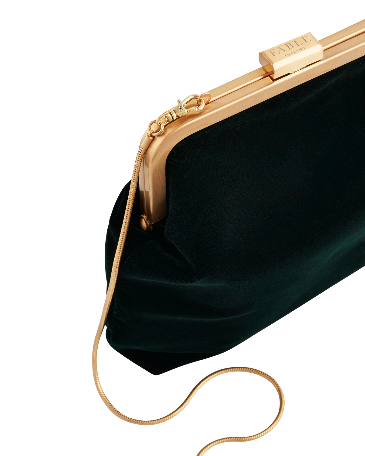 Dark green clutch with gold frame and chain on a white background