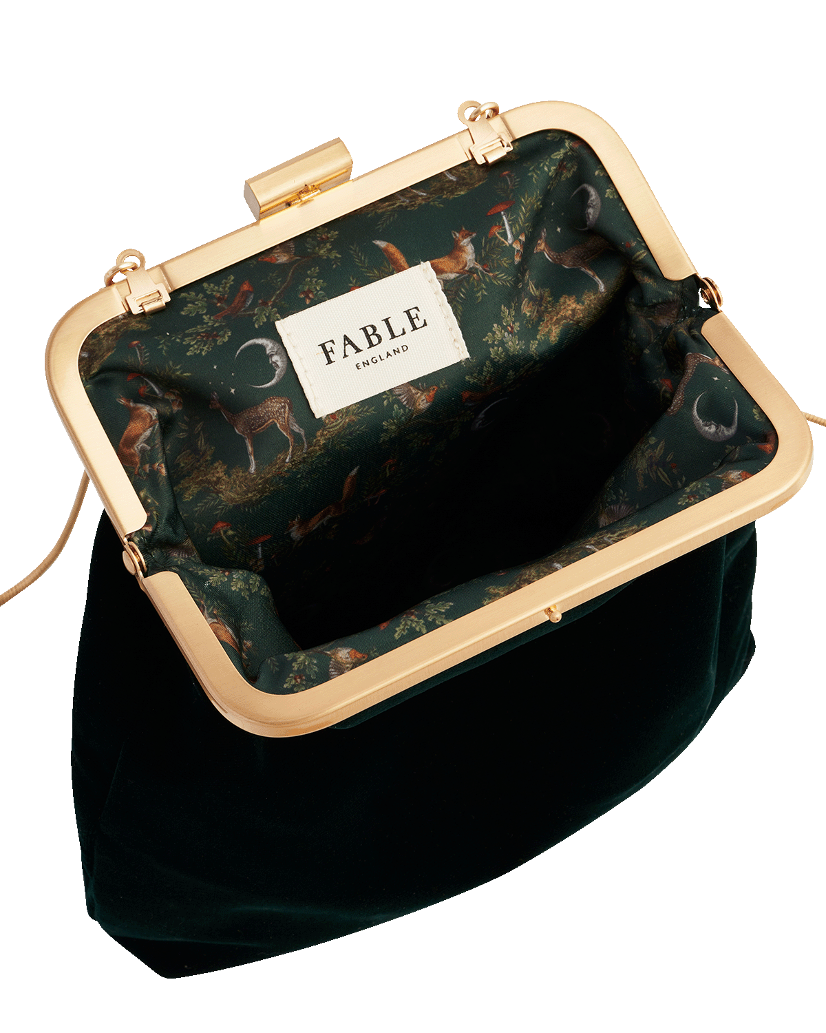 Green handbag with gold frame and 'Fable' label on a white background