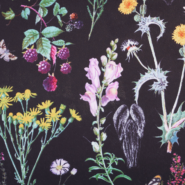 Floral and insect pattern on a tote bag on a white background