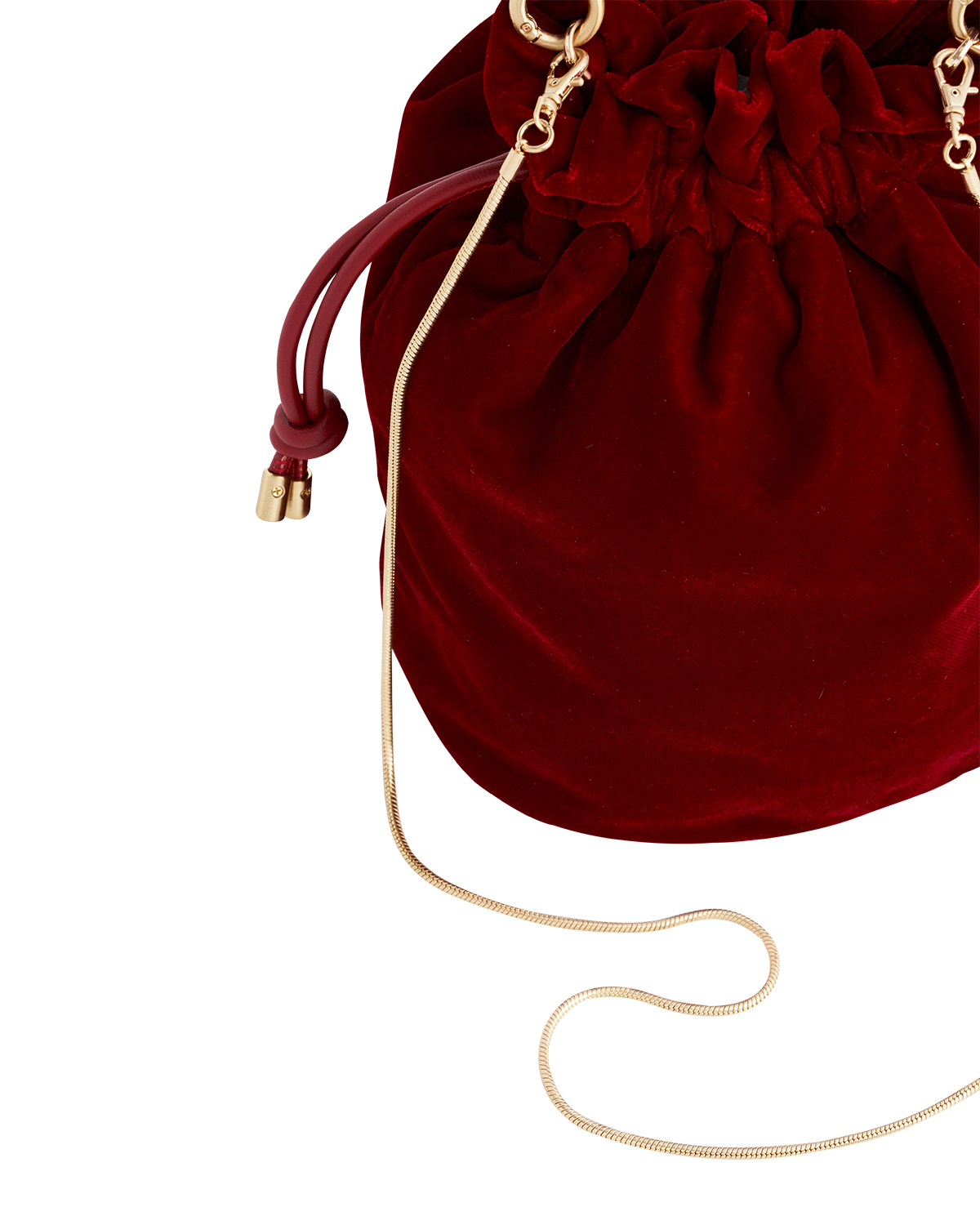 Red velvet drawstring bag with gold tassel on a white background