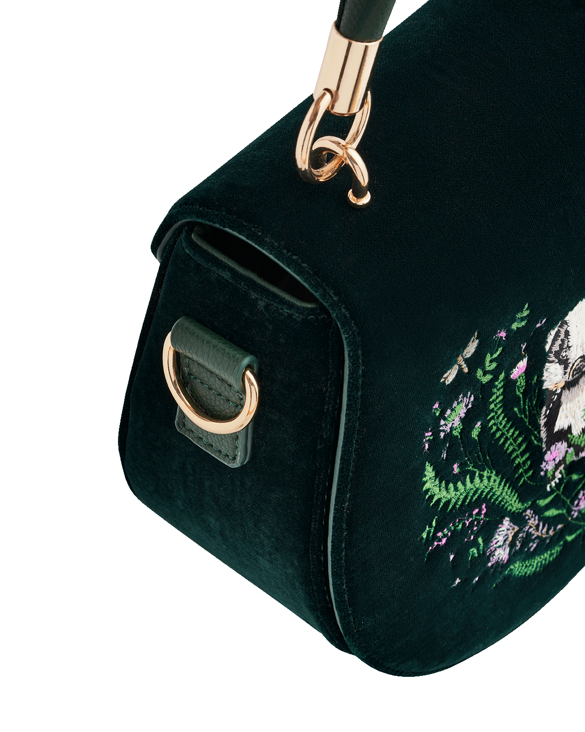 Green handbag with floral badger embroidery on a white background