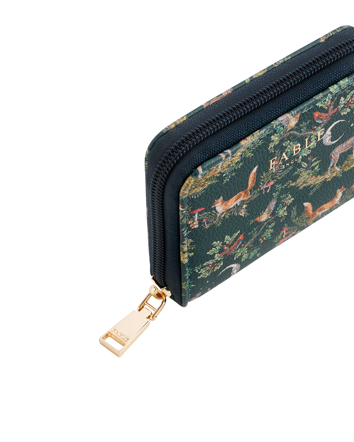 Zipper purse with nature-themed design on a white background