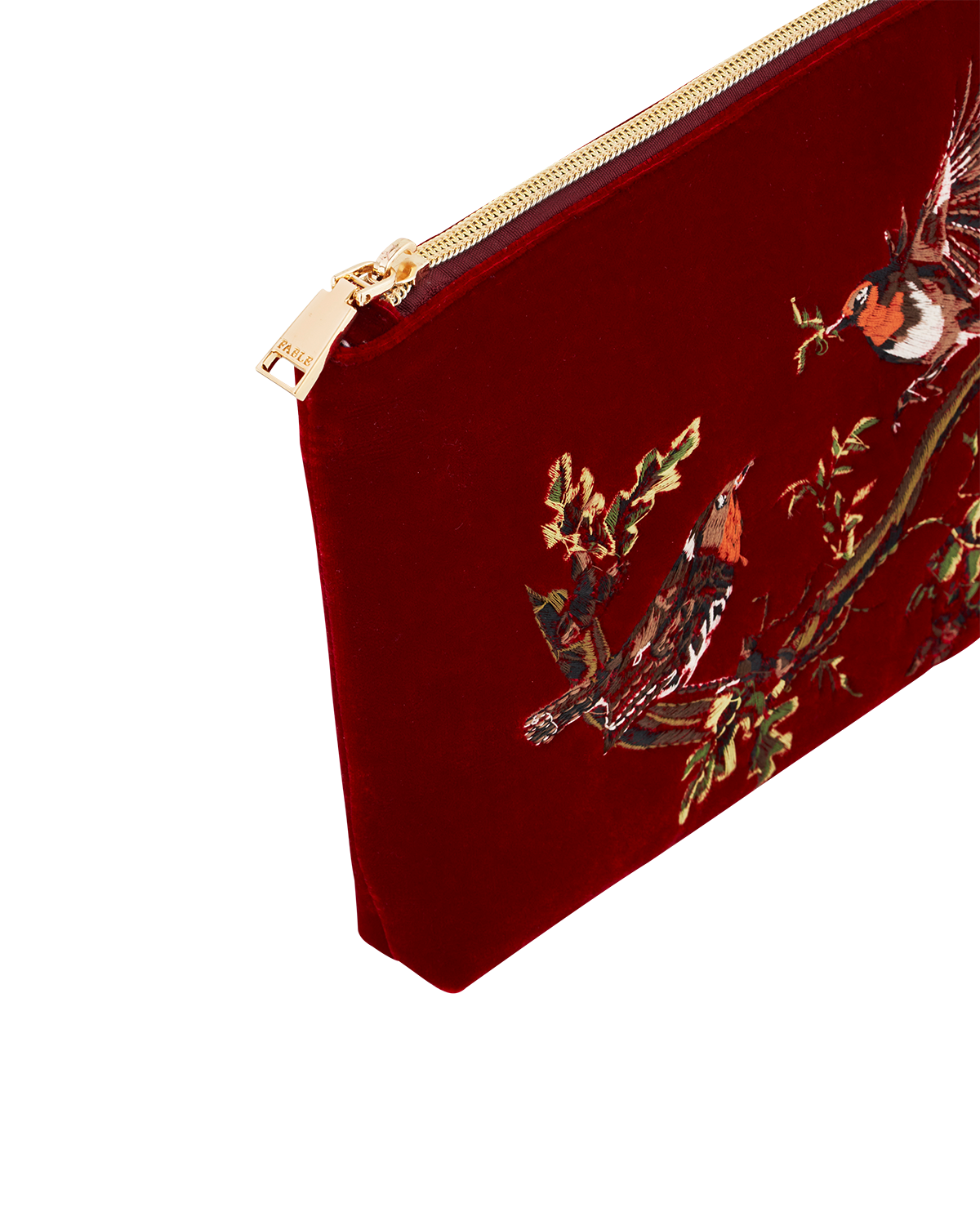 Red pouch with gold zipper and bird embroidery on a white background
