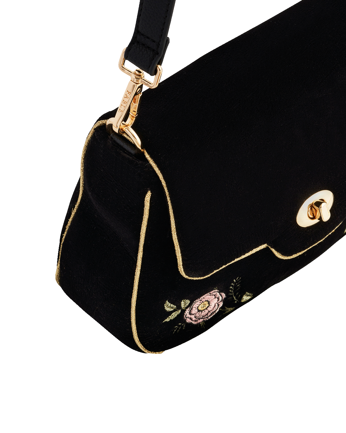 Black handbag with gold accents and floral embroidery on a white background
