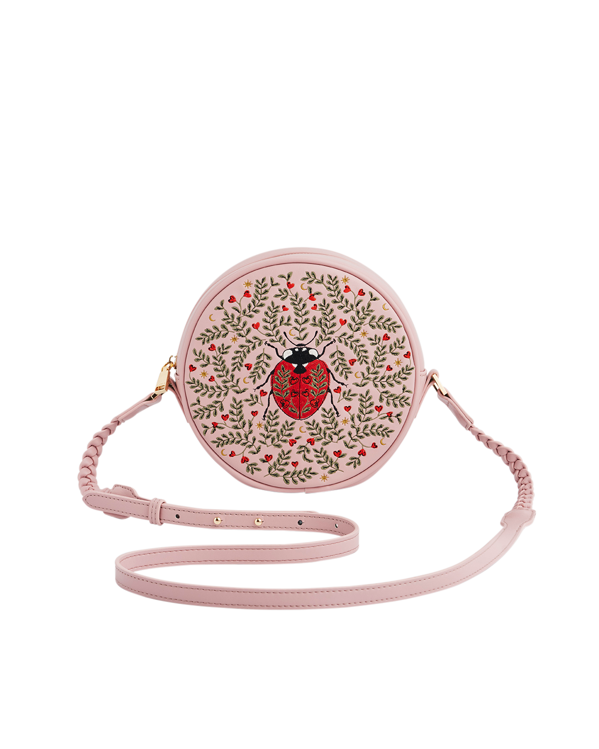 Round pink handbag with floral and ladybug design on a white background
