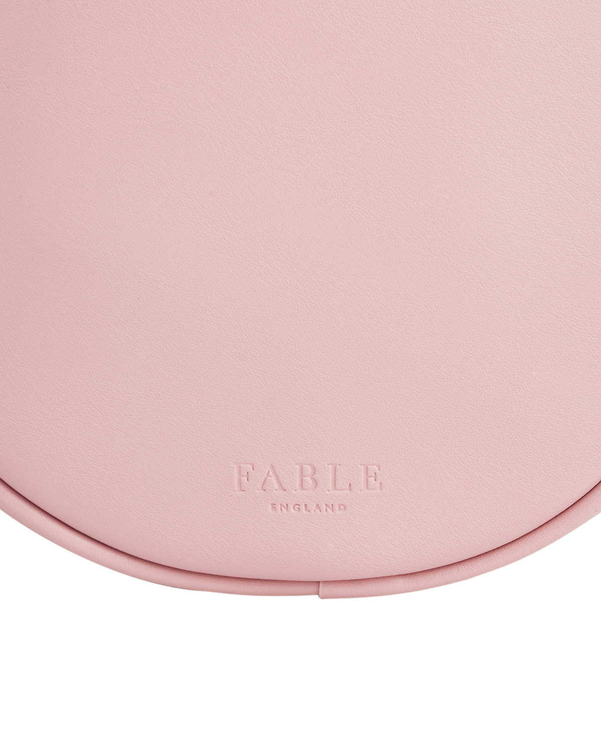 pink circle bag with fable logo