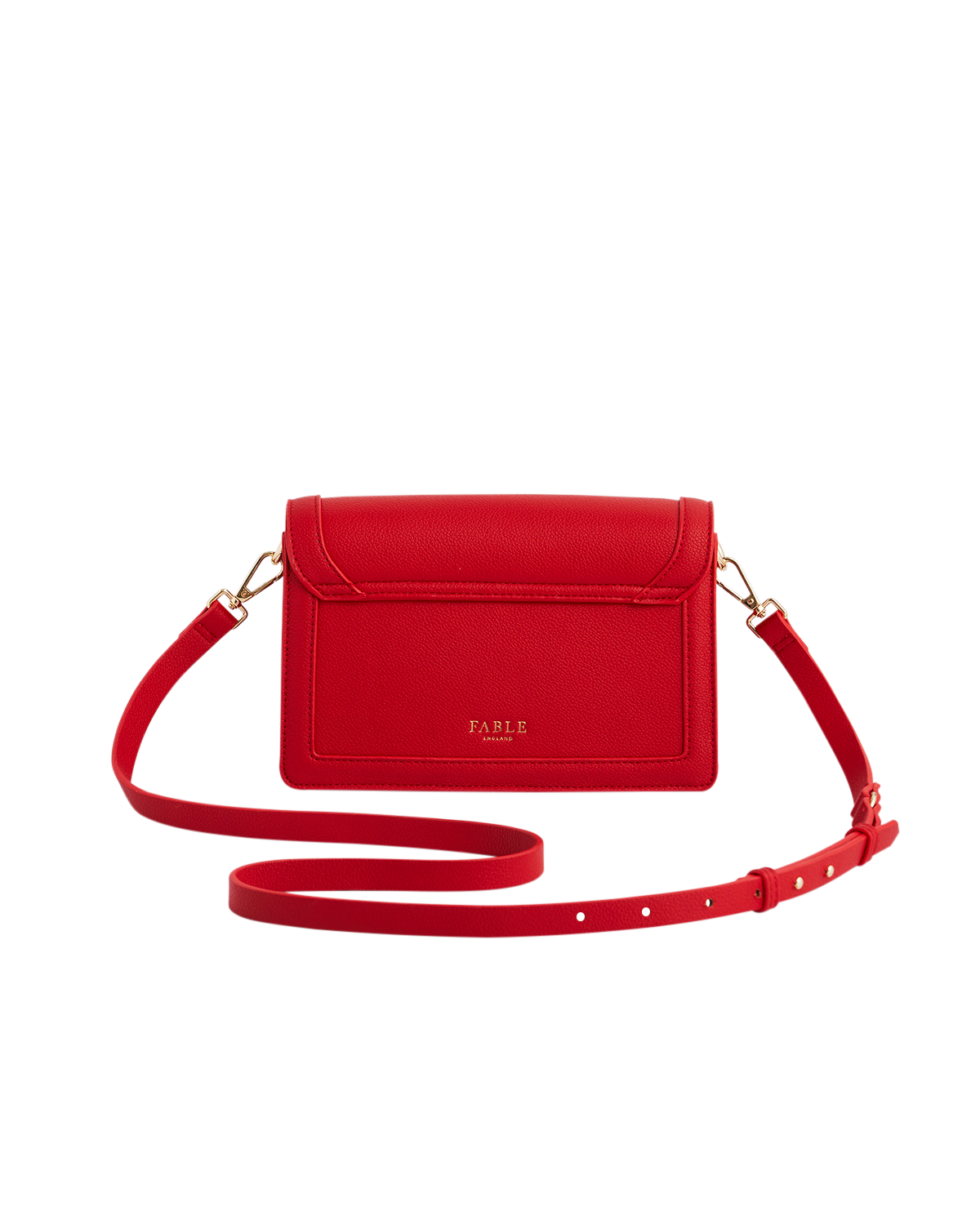 Red handbag with a strap on a white background
