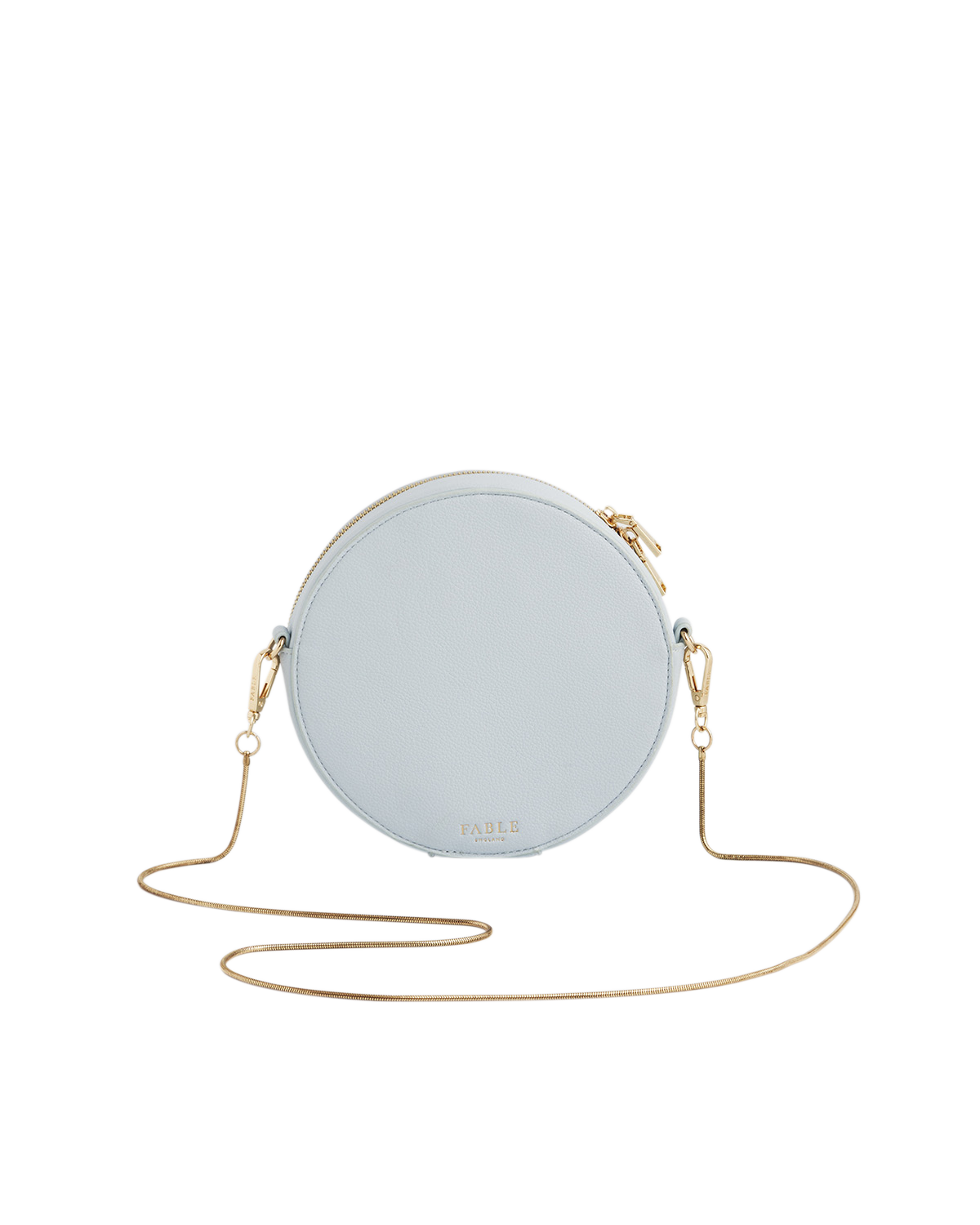 Round light blue handbag with a gold chain strap on a white background