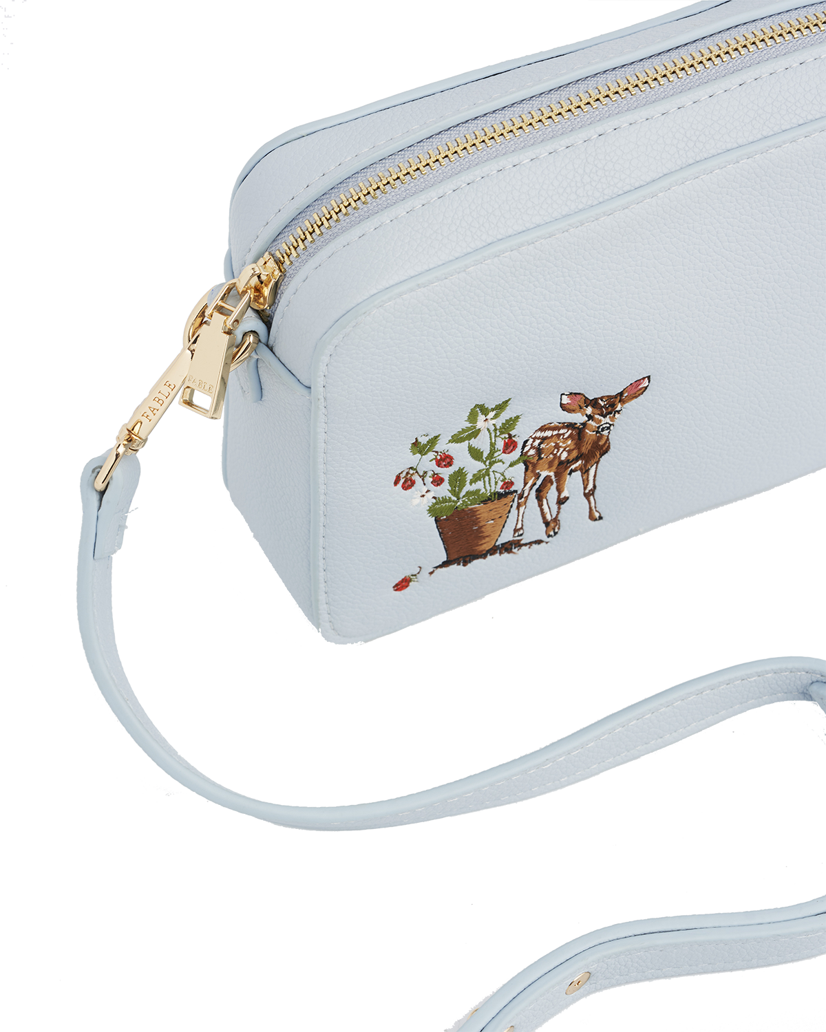 light blue camera bag with strawberry plant and fawn embroidery detail