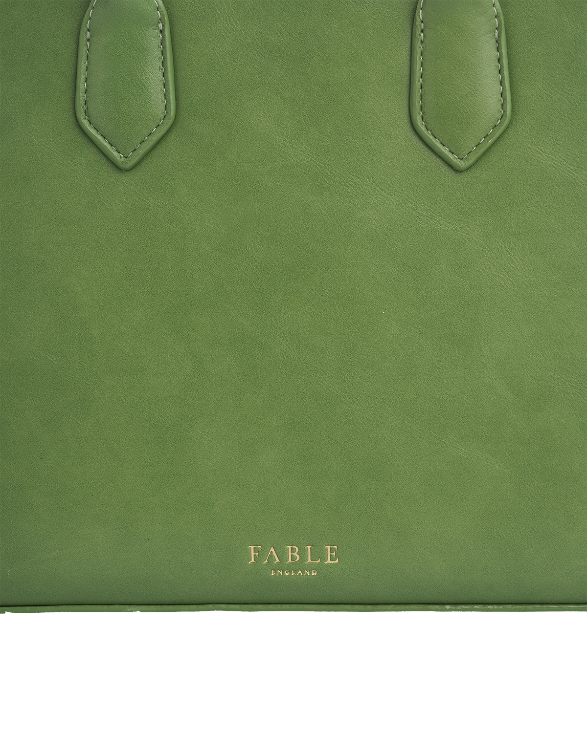 Green bag with gold fable logo