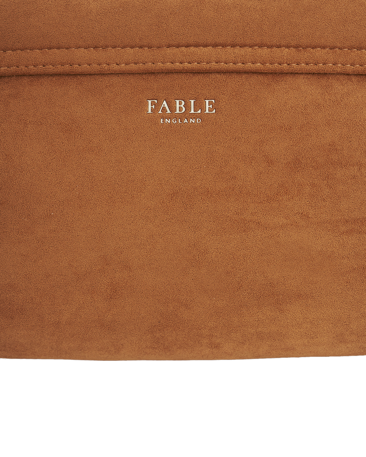 Brown leather product with 'Fable England' branding.