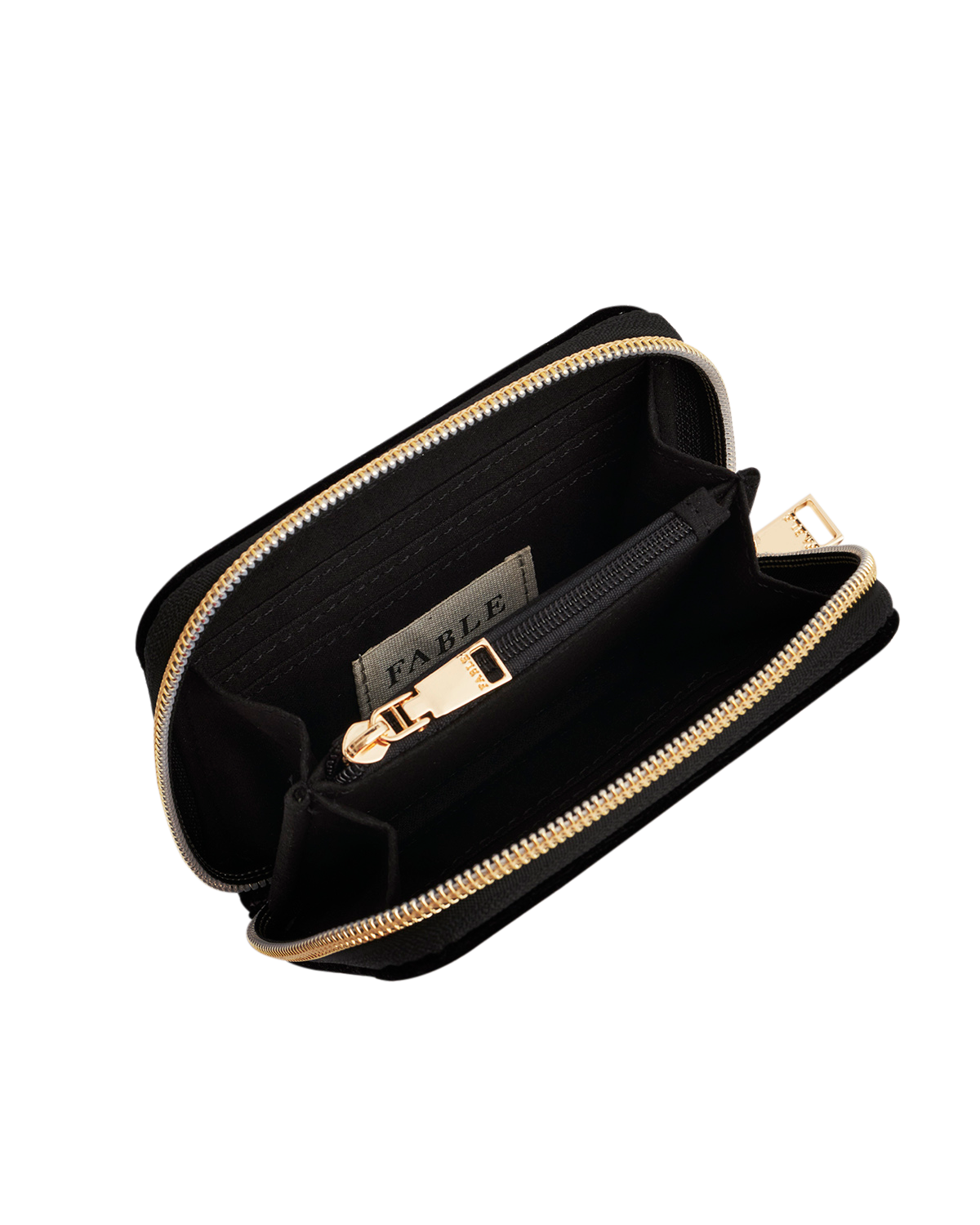 Black clutch with gold zipper and 'Fable' branding on a white background