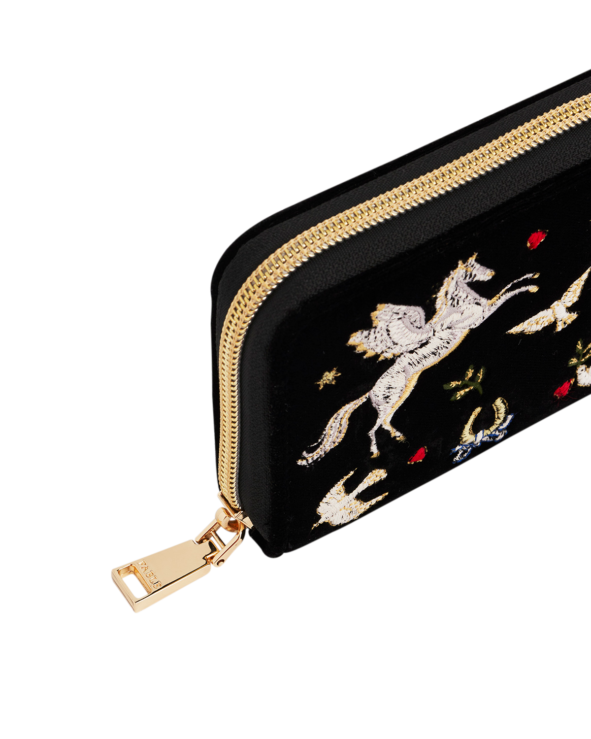 Black purse with gold zipper and embroidered designs on a white background