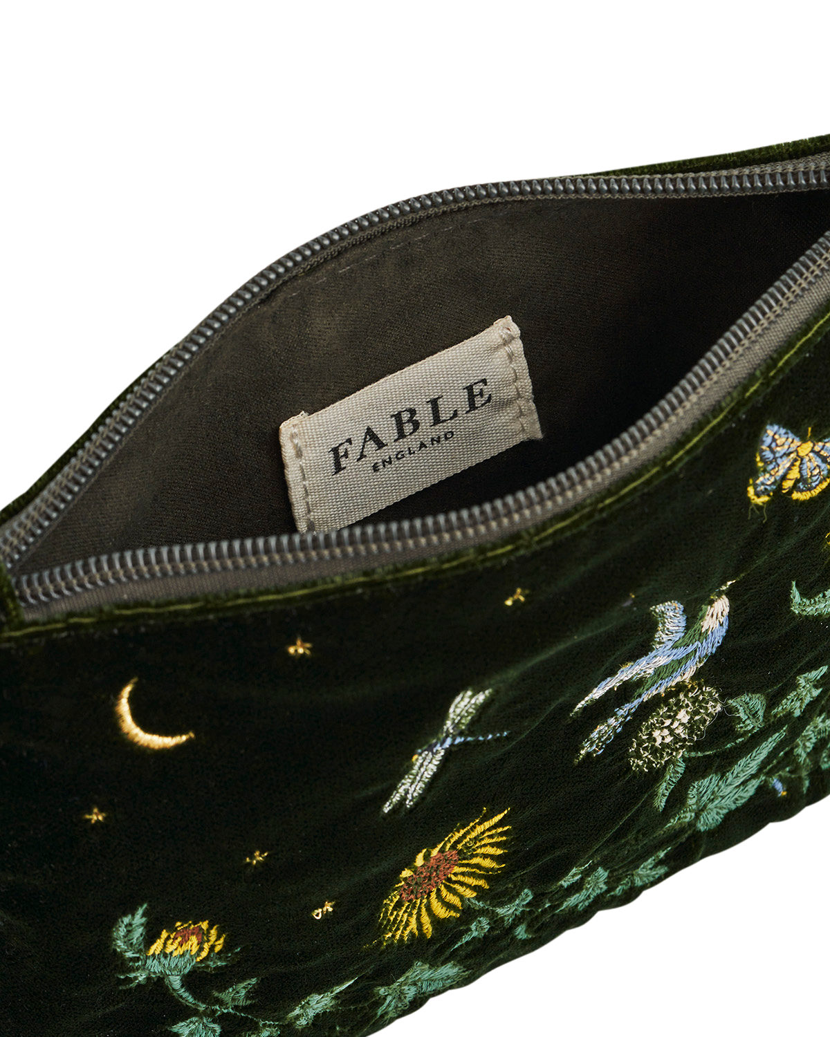 Embroidered pouch with Fable label on a white background