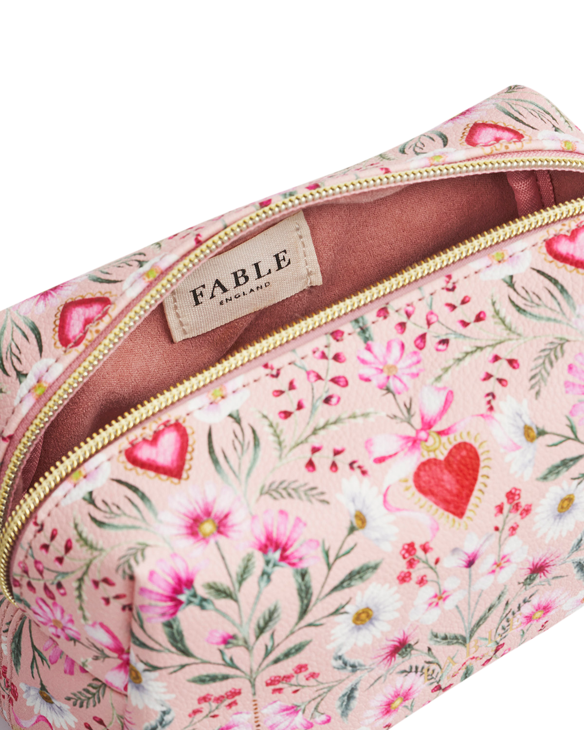 Floral patterned pouch with 'Fable' branding on a white background