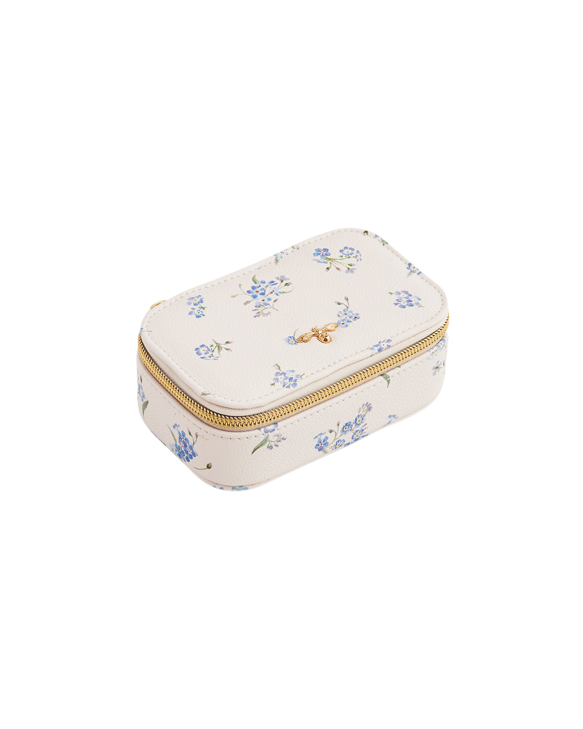 Small cream-colored jewelry box with floral patterns and a gold zipper on a white background