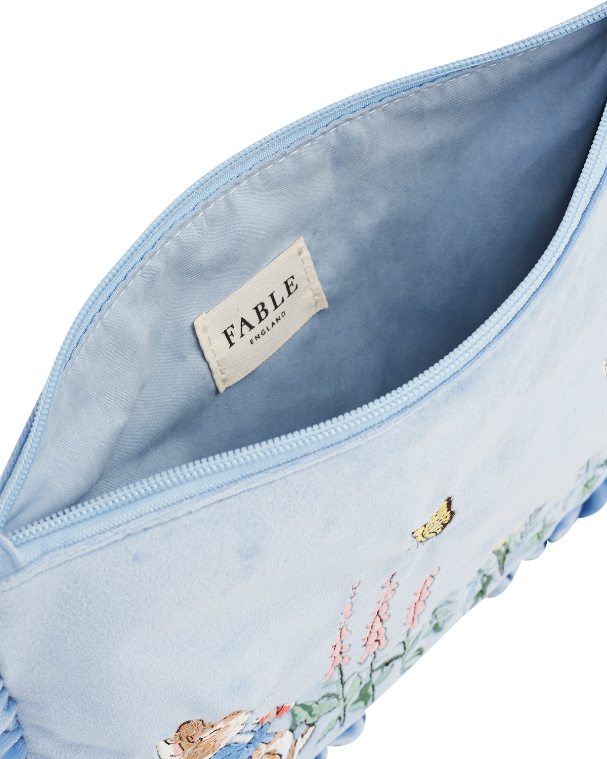 Peter Rabbit blue velvet embroidered ruffle detail pouch
