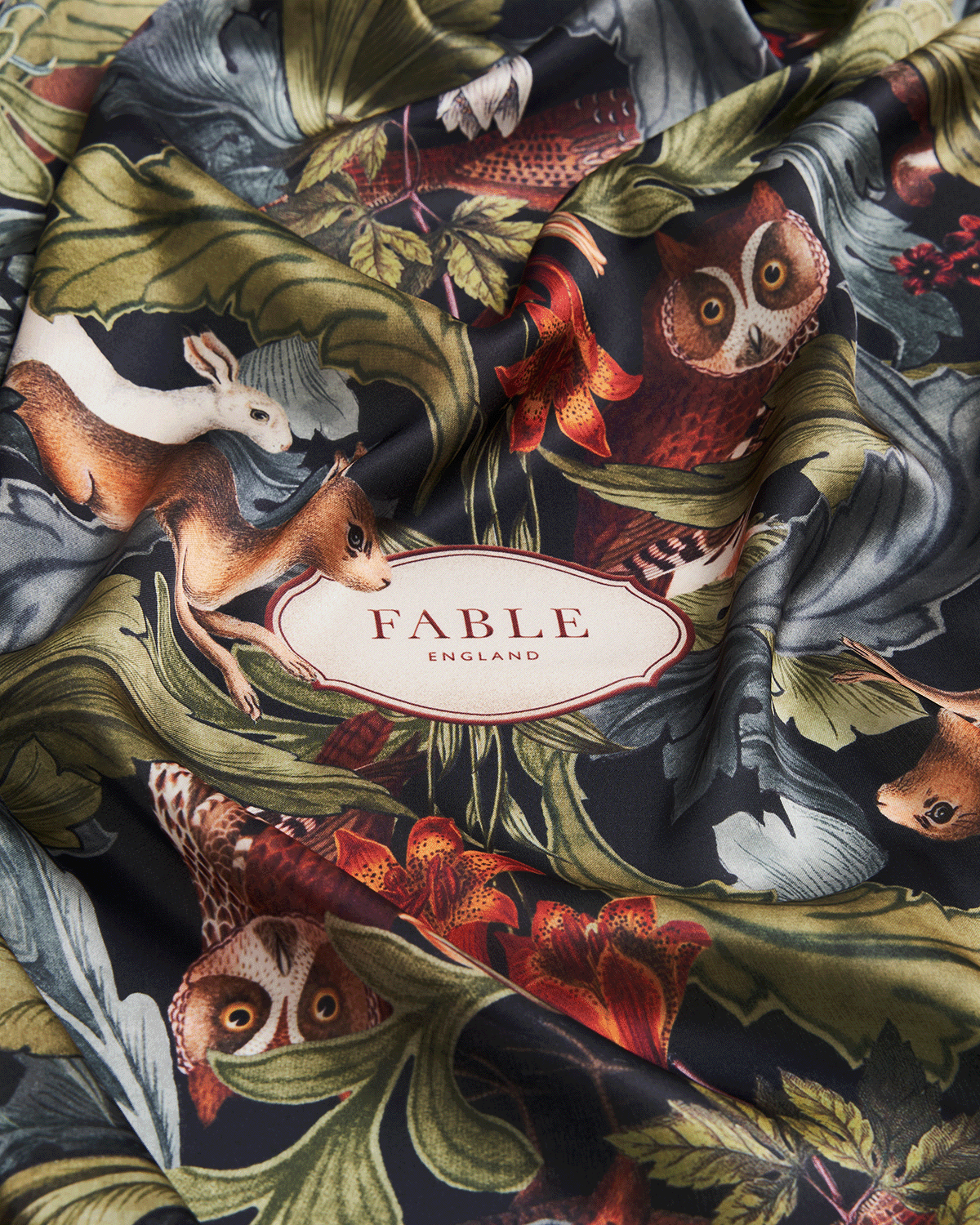 Fable England square scarf with animal and nature-themed design