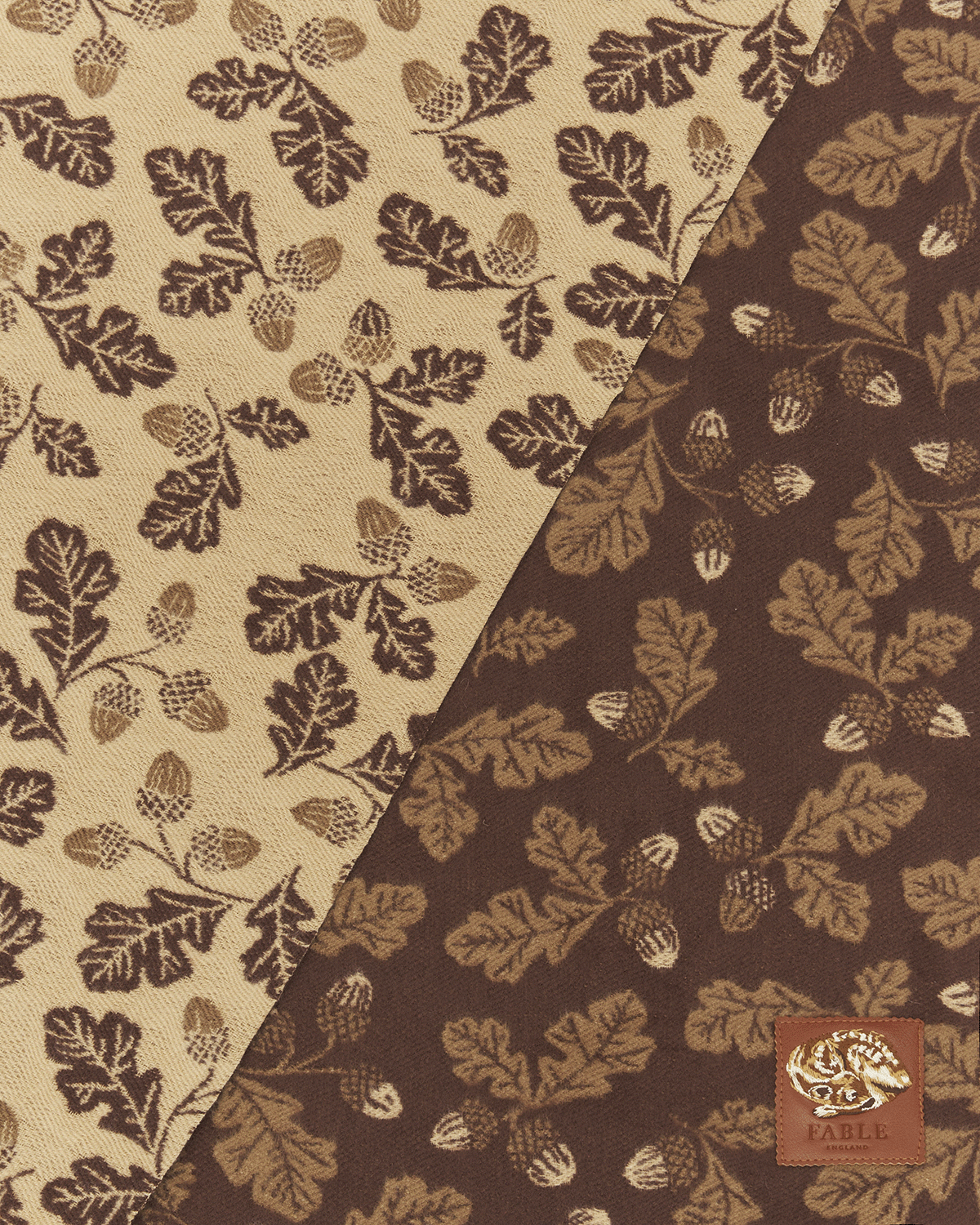 Two fabric swatches with leaf pattern, one beige and one brown, featuring a brand logo in the corner.