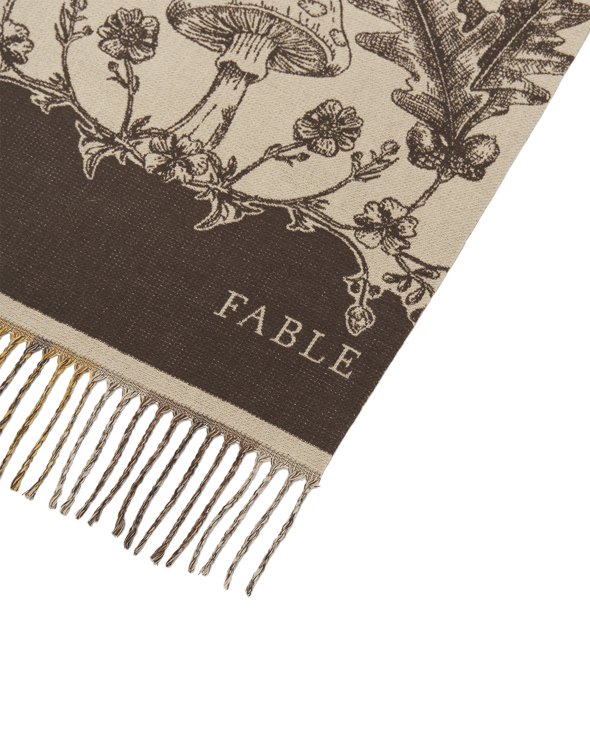 Scarf with mushroom and foliage design and 'Fable' branding