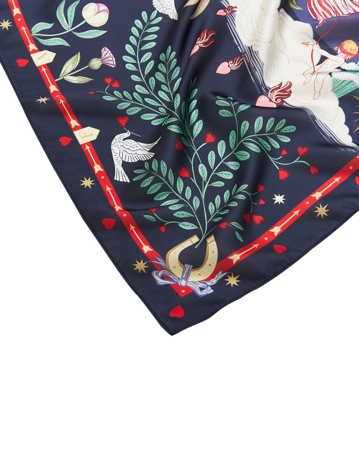 Navy blue scarf with colorful decorative patterns including leaves, hearts, and a horseshoe.