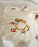 Hand Painted Shell Worn Gold Charm Bracelet by Fable England