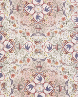 close up detail of wildlife printed silky scarf with hearts, bunnies, flowers and swallows.