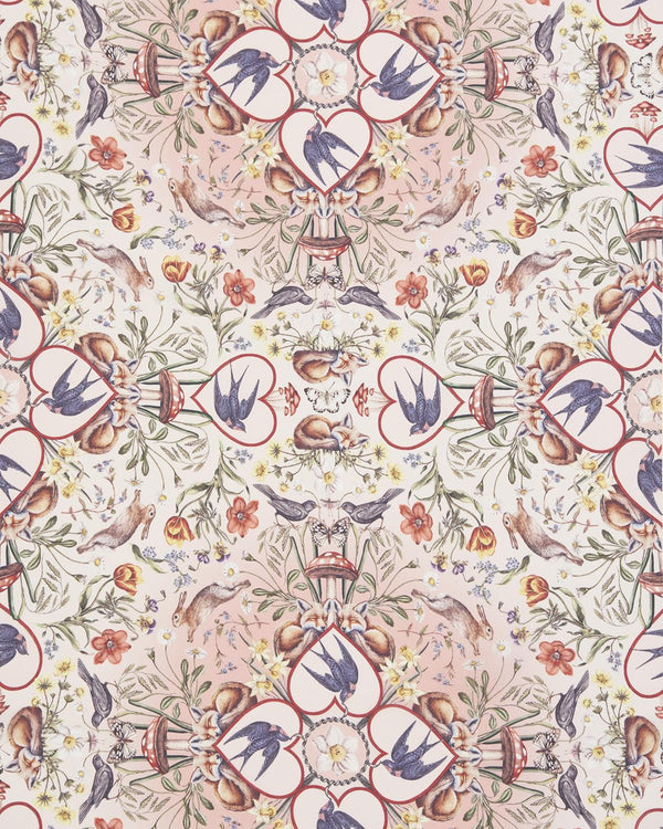 close up detail of wildlife printed silky scarf with hearts, bunnies, flowers and swallows.