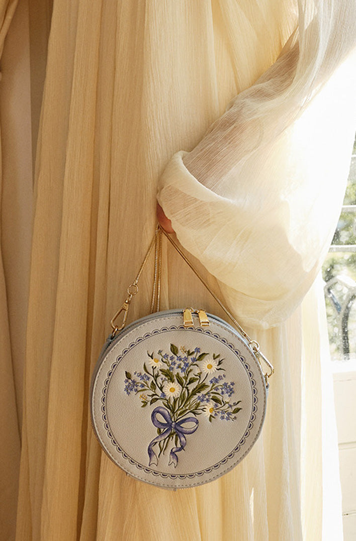 light blue circle floral embroidered bag with gold snake chain