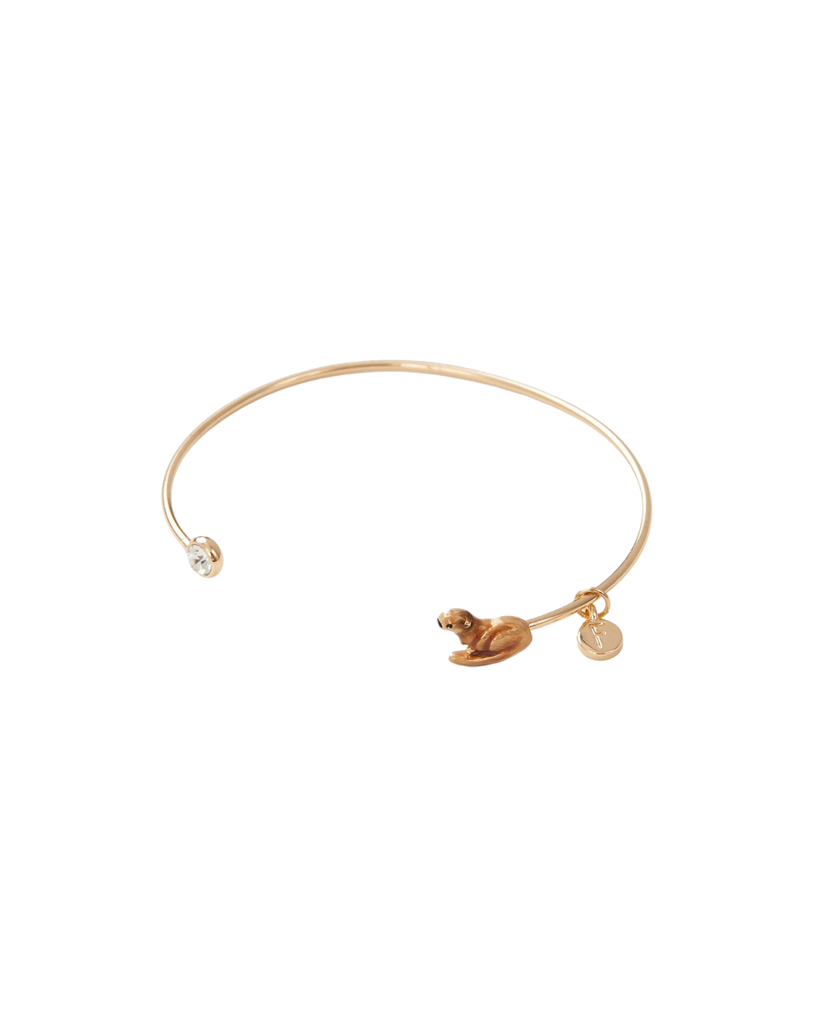 Gold bracelet with otter charm on a white background