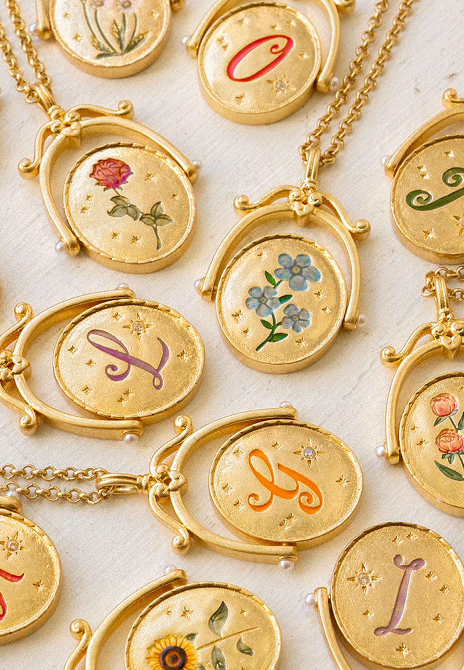 gold spinner necklaces