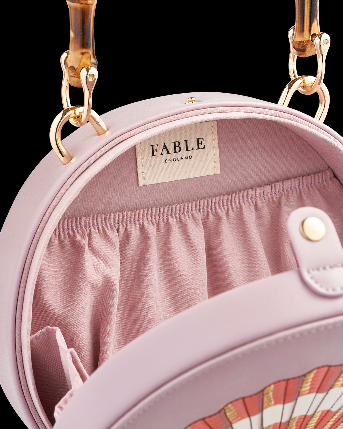 Embroidered Shell Bamboo Top Handle Bag in Lilac | Fable England