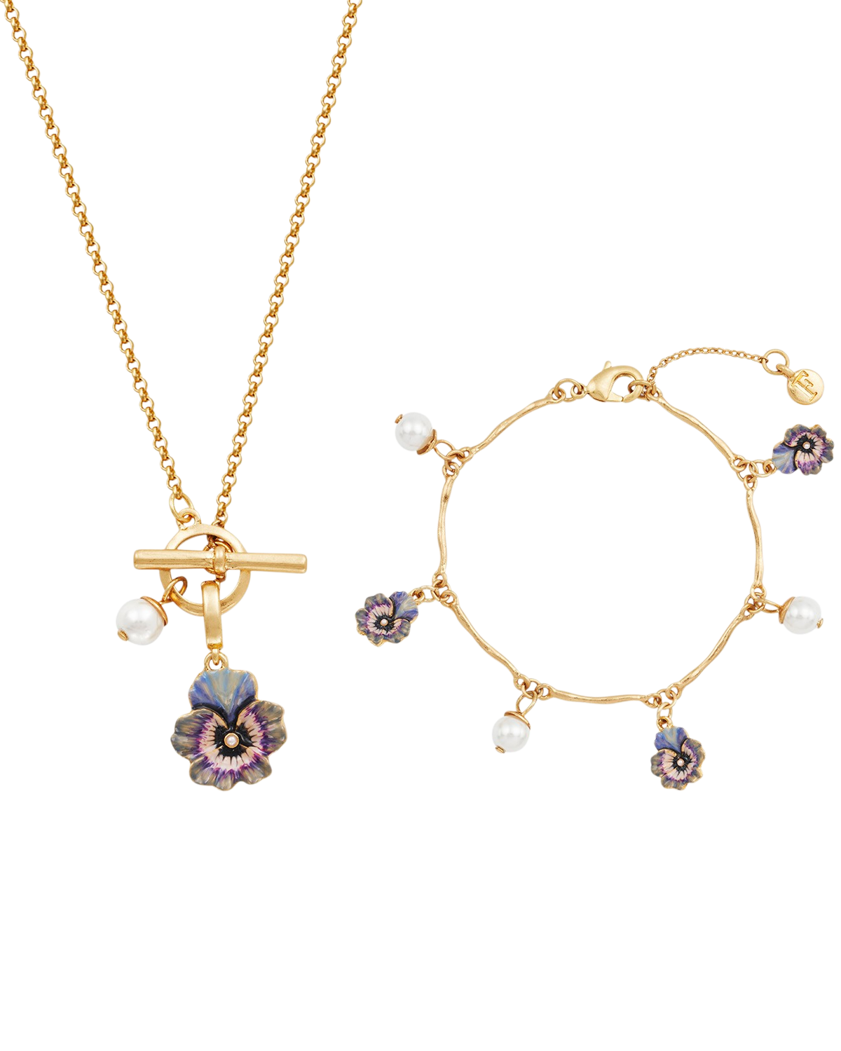 Gold necklace with floral pendant and matching bracelet on a white background