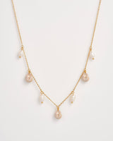 Sea Snail Charm & Pearl Worn Gold Necklace by Fable England