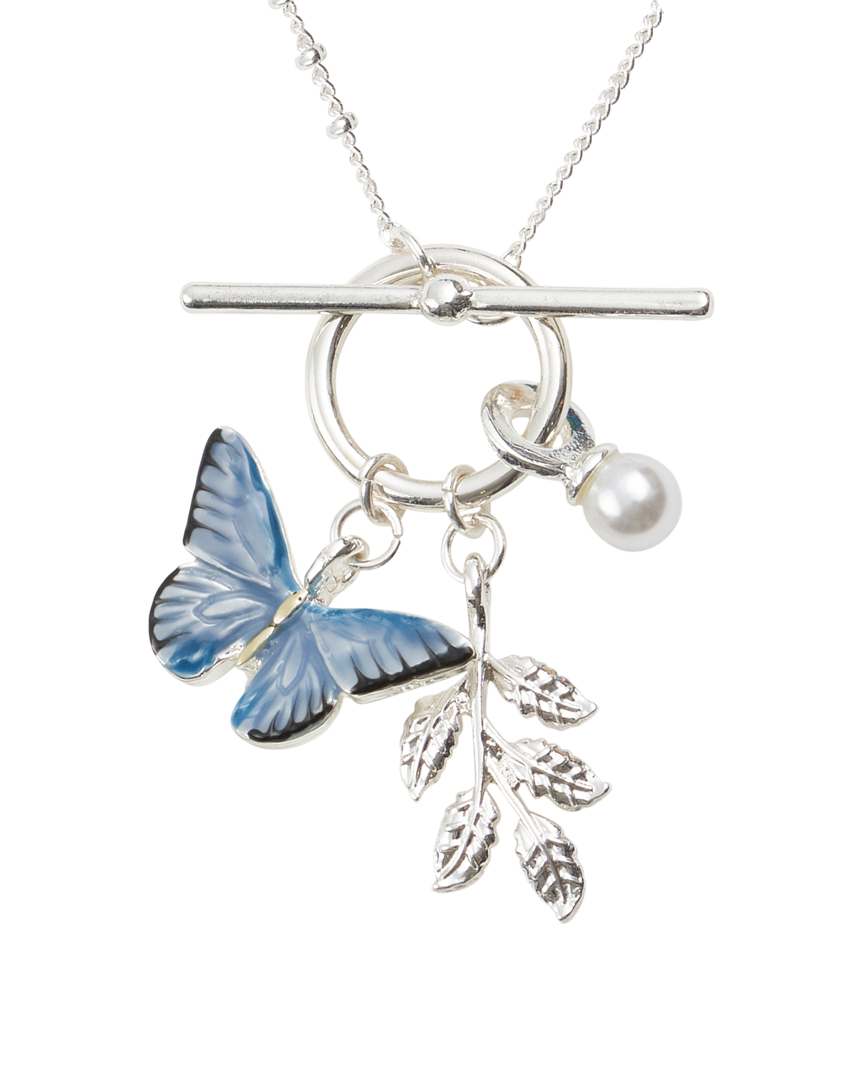 Silver necklace with a blue butterfly, leaf branch, and pearl charm on a white background