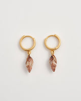 Spiral Shell Worn Gold Huggie Hoops by Fable England