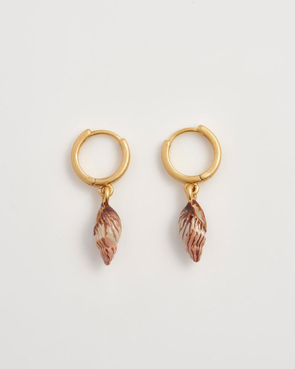 Spiral Shell Worn Gold Huggie Hoops by Fable England